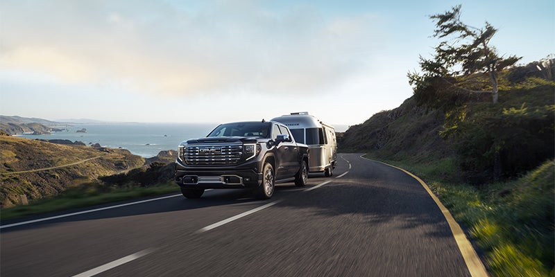 2023 GMC Sierra at Doug Henry GMC pulling a trailer