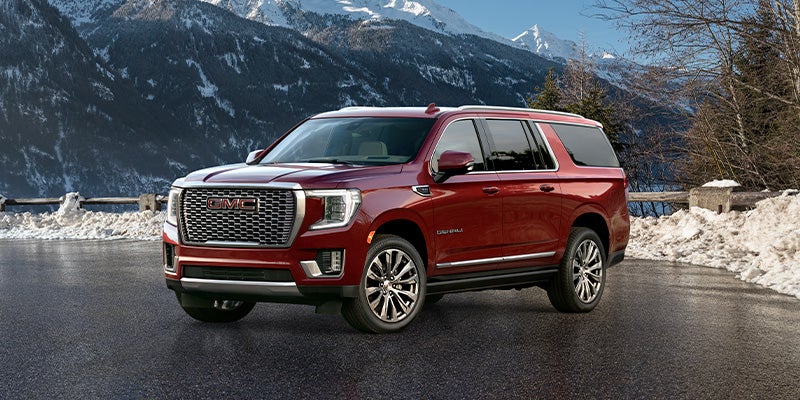 2024 GMC Yukon XL from Doug Henry GMC in front of mountains