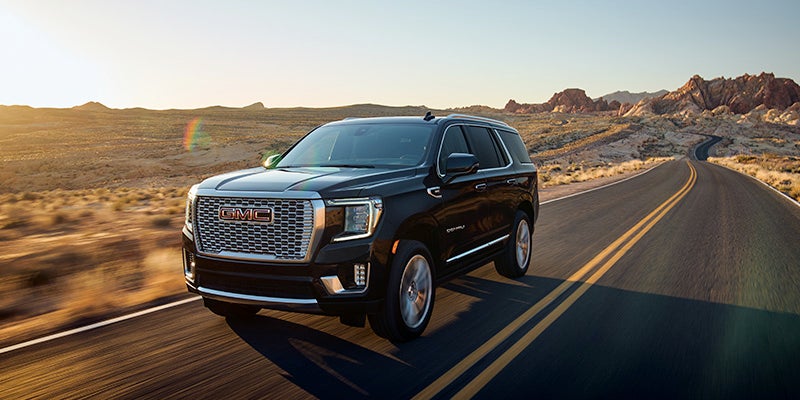 2024 GMC Yukon at Doug Henry GMC driving on highway